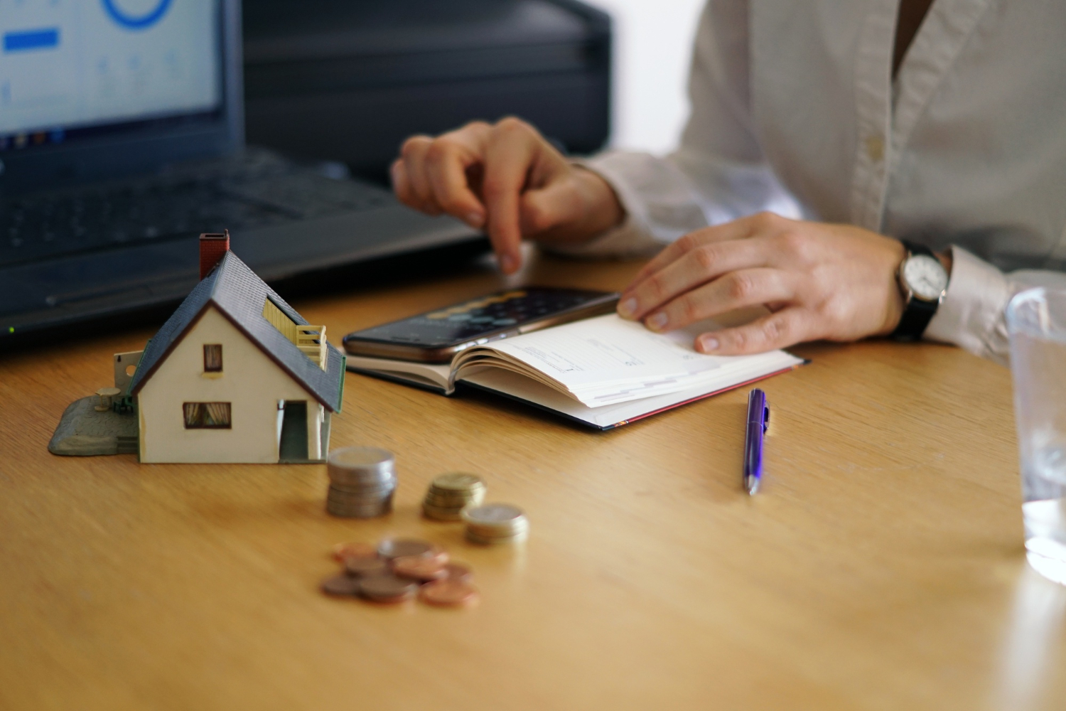 closeup-shot-person-thinking-buying-selling-house-1